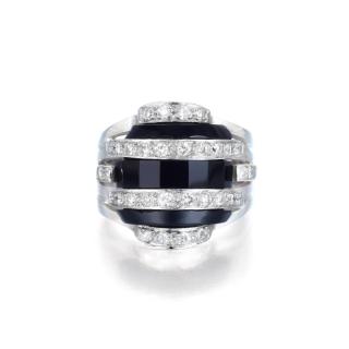 Appraisal: A Diamond and Onyx Ring Designed as stripes of onyx