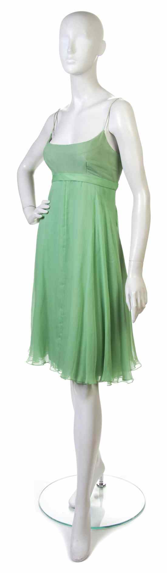 Appraisal: A Nina Ricci Green Silk Chiffon Cocktail Dress with bow