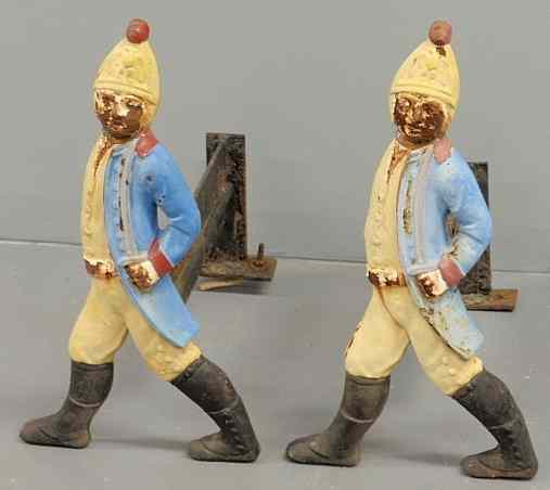 Appraisal: Pair of cast iron Revolutionary War soldier andirons h x