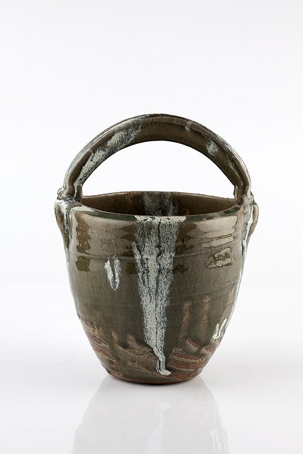 Appraisal: Takeshi Yasuda Japanese b Bucket formrunning green ash glaze with