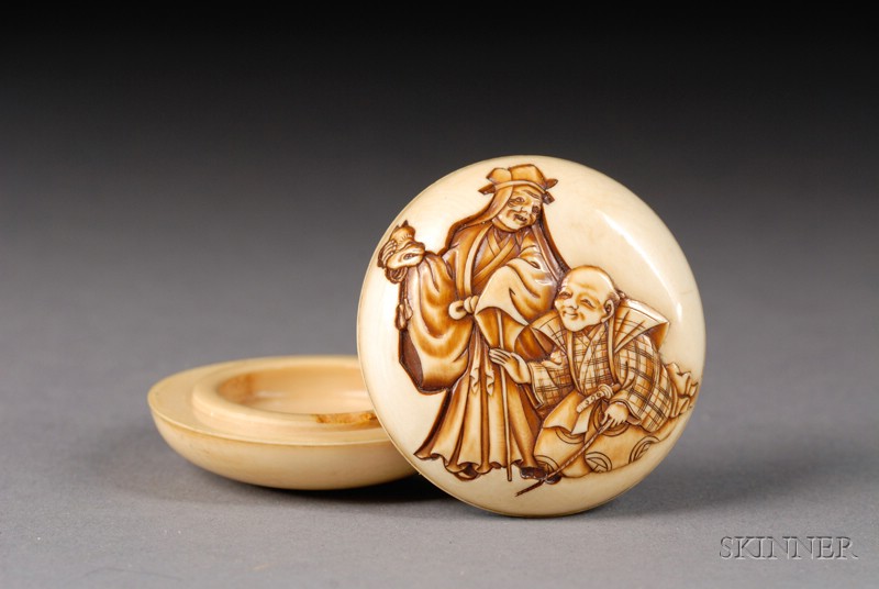 Appraisal: Ivory Netsuke th century Manju type carved in low relief