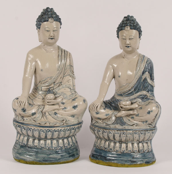 Appraisal: Pair Asian ceramic seated Buddha figures H