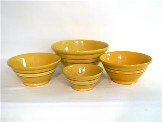 Appraisal: Yellowware four bowls with brown and cream bands some roughness