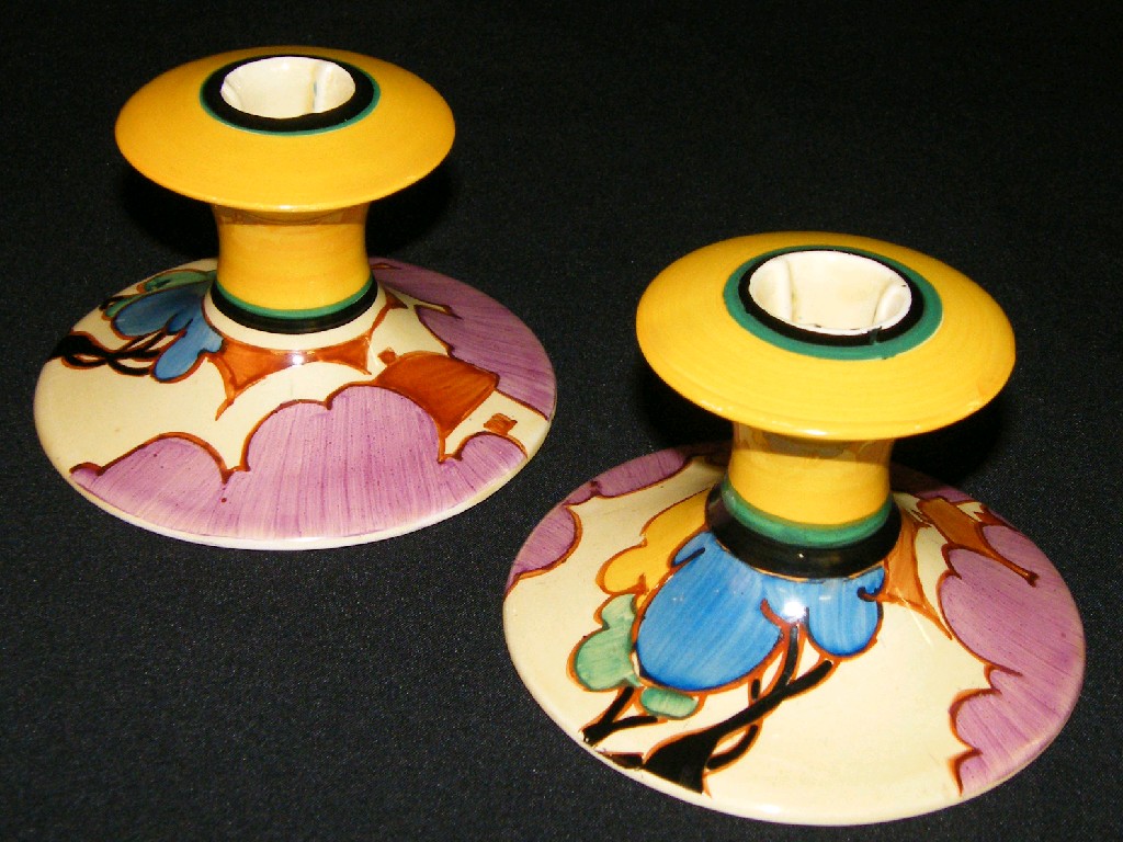 Appraisal: Good pair of Clarice Cliff 'Autumn Fantasque' Bizarre squat candlesticks