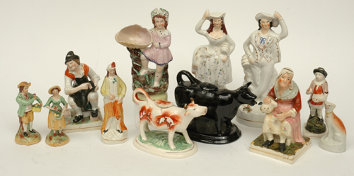 Appraisal: A COLLECTION OF MOSTLY TH CENTURY POTTERY FIGURES Including two