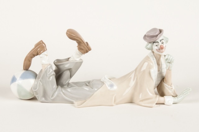 Appraisal: Lladro porcelain clown modeled as reclining clown with ball in