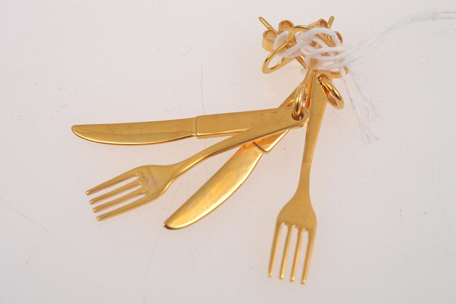 Appraisal: A PAIR OF FORK AND KNIFE EARRINGS IN CT GOLD