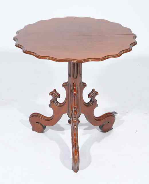 Appraisal: A TH CENTURY MAHOGANY SNAP TOP TRIPOD LOW OCCASIONAL TABLE