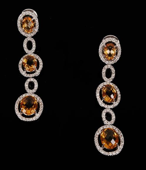 Appraisal: A pair of citrine and diamond earrings each designed as