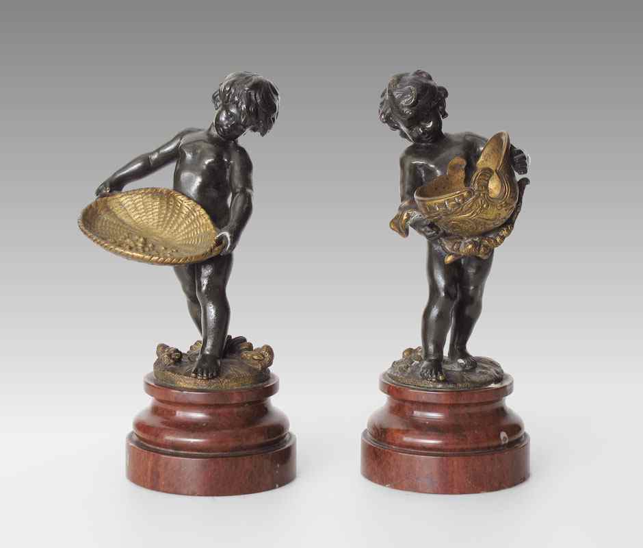 Appraisal: PAIR OF BRONZE CHERUBIC FIGURES SIGNED AUG MOREAU Circa first