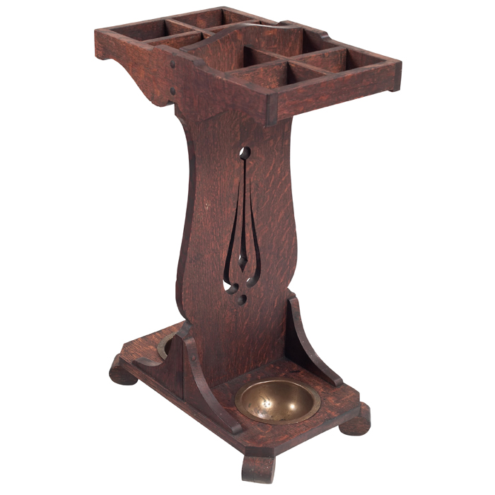 Appraisal: Lakeside Craftshop umbrella stand central cut-out slab supports dual umbrellacompartments