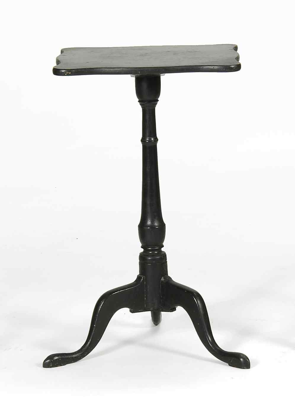 Appraisal: ANTIQUE AMERICAN CANDLESTAND th CenturyIn black paint Shaped square top