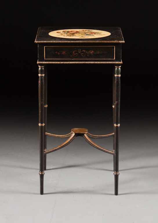 Appraisal: Regency style paint decorated ebonized wood sewing stand th century