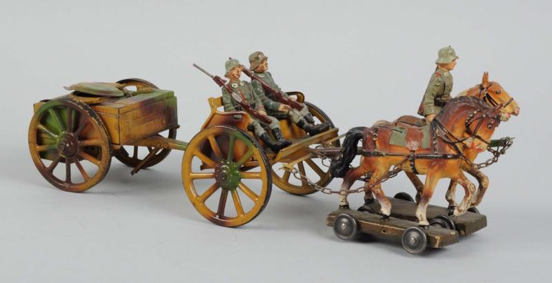 Appraisal: Lineol Tinplate Horse-Drawn Field Kitchen Depicts two horses pulling two