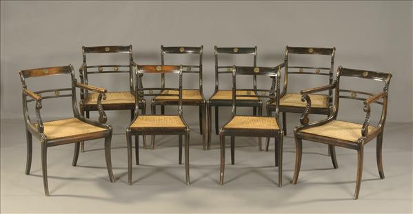 Appraisal: A set of eight Regency brass mounted ebonised beech dining