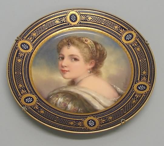 Appraisal: Blue border with gilt accents and jeweling surounding a portrait