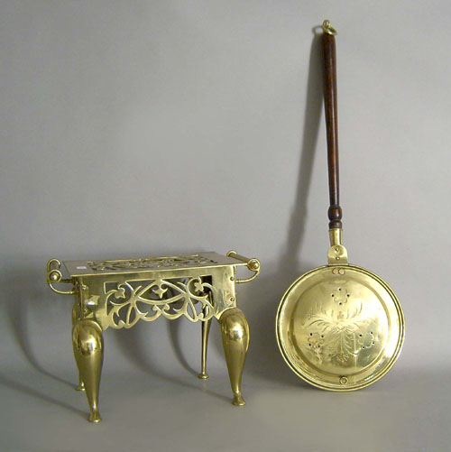 Appraisal: Brass bedwarmer together with a footman