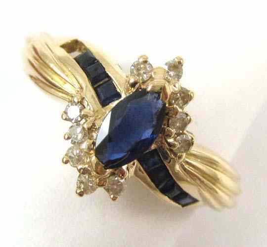 Appraisal: SAPPHIRE DIAMOND AND FOURTEEN KARAT GOLD RING set with ten