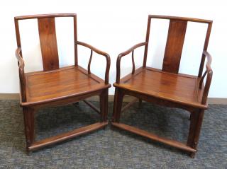 Appraisal: Pair Huanghuali Chairs Pair Huanghuali Chairs With paneled seats and