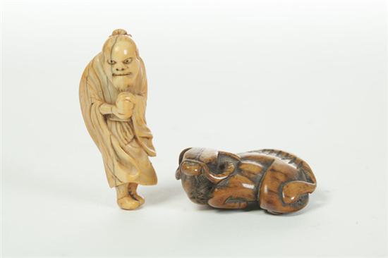 Appraisal: TWO NETSUKES Japan nd half- th-early th century Ivory figure