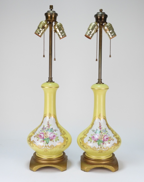 Appraisal: PR YELLOW HAND PAINTED FLORAL PORCELAIN LAMPS United StatesEarly th