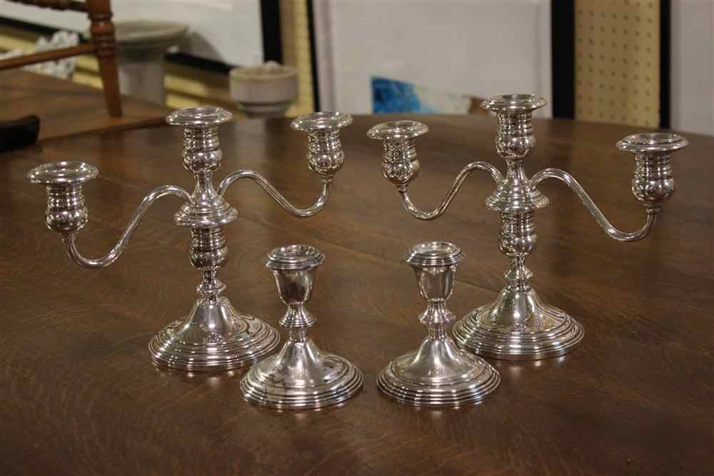 Appraisal: TWO PAIRS OF WEIGHTED CANDLE HOLDERS including a pair of