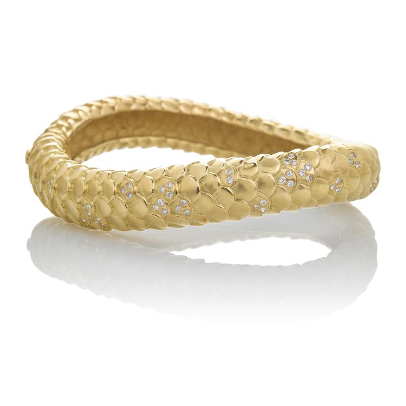 Appraisal: ANGELA CUMMINGS DIAMOND AND K GOLD BRACELET Serpentine hinged form