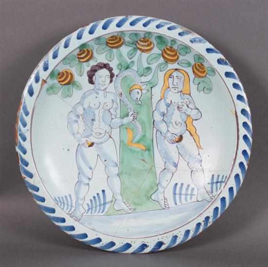 Appraisal: Rare Brislington Delftware Adam and Eve charger circa blue border