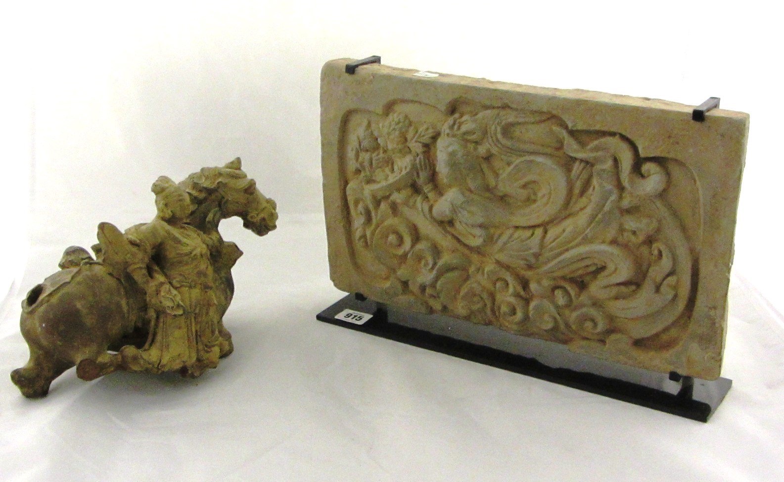 Appraisal: A Chinese rectangular tile possibly Song Yuan dynasty depicting an