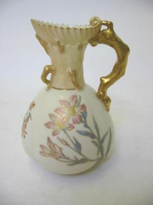 Appraisal: A ROYAL WORCESTER BLUSH IVORY CORAL TWIG JUG of lobed