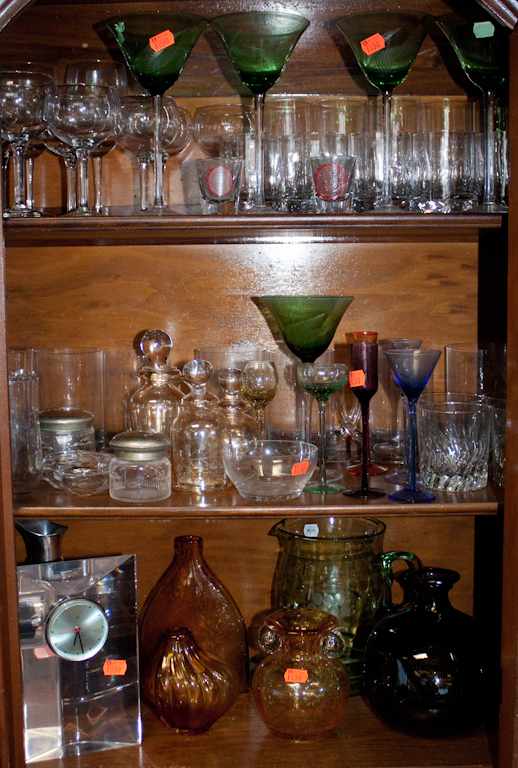 Appraisal: Large assortment of glassware including stemware colored glass vases jars