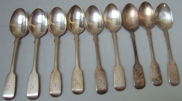 Appraisal: Nine silver Victorian fiddle pattern teaspoons initialed L London