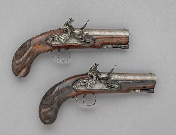 Appraisal: A pair of large bore Irish flintlock traveling pistols by