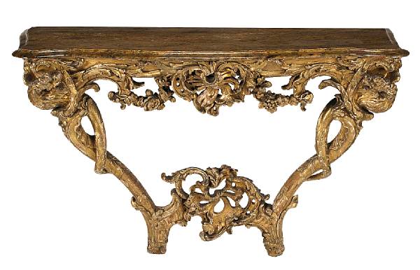 Appraisal: An early Louis XV giltwood console d'applique in the manner