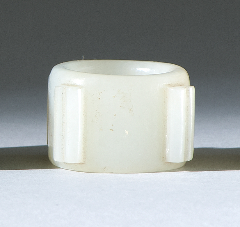 Appraisal: WHITE JADE ZUN th CenturyWith four raised flanges in double