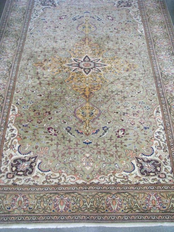 Appraisal: An Oriental room-size rug traditional Tabriz style design light sage