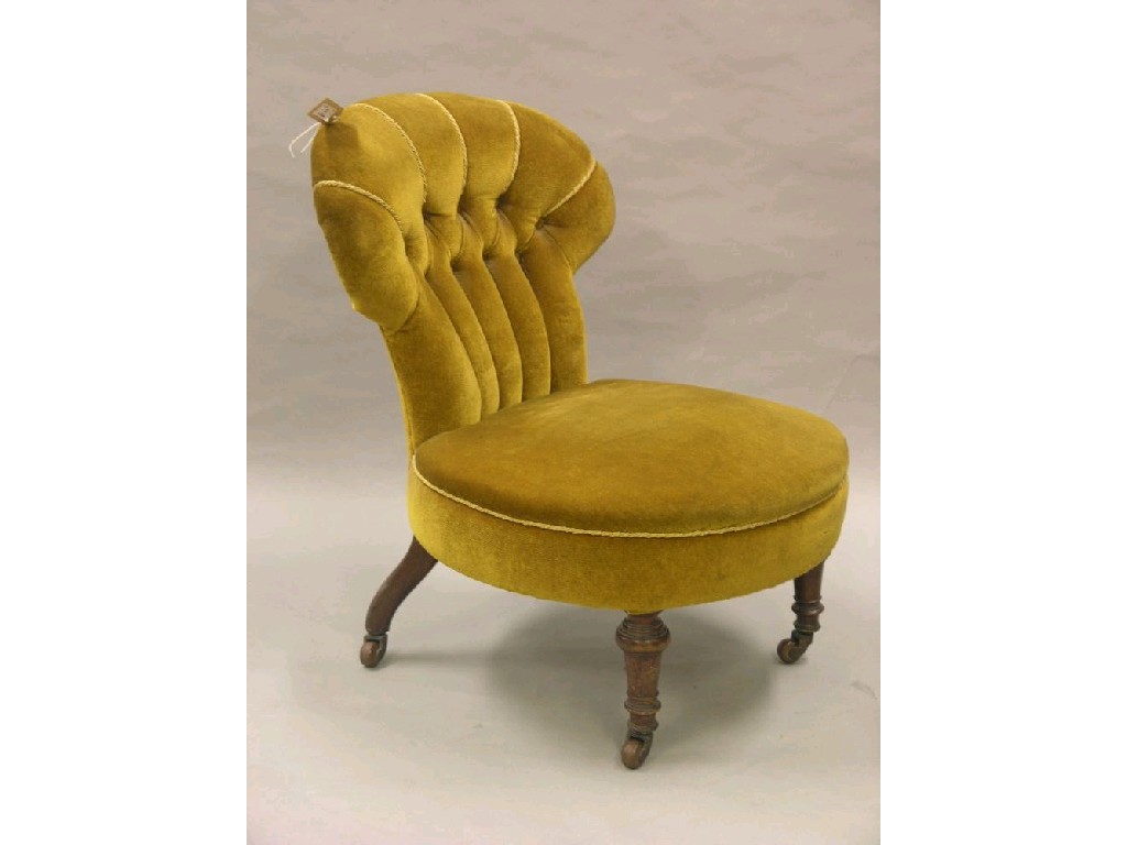 Appraisal: A Victorian upholstered nursing chair shell-shaped back on turned and