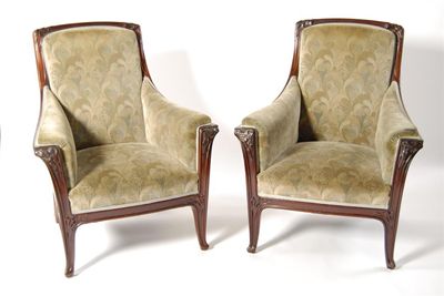 Appraisal: A pair of Louis Majorelle Art Nouveau mahogany armchairs with