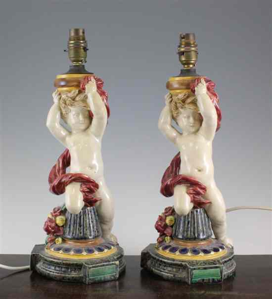 Appraisal: A pair of Continental majolica figural lamp bases late th