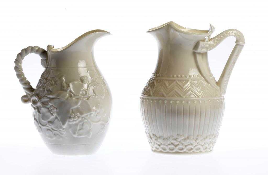 Appraisal: A BELLEEK HARP JUG AND A BELLEEK IVY JUG cm