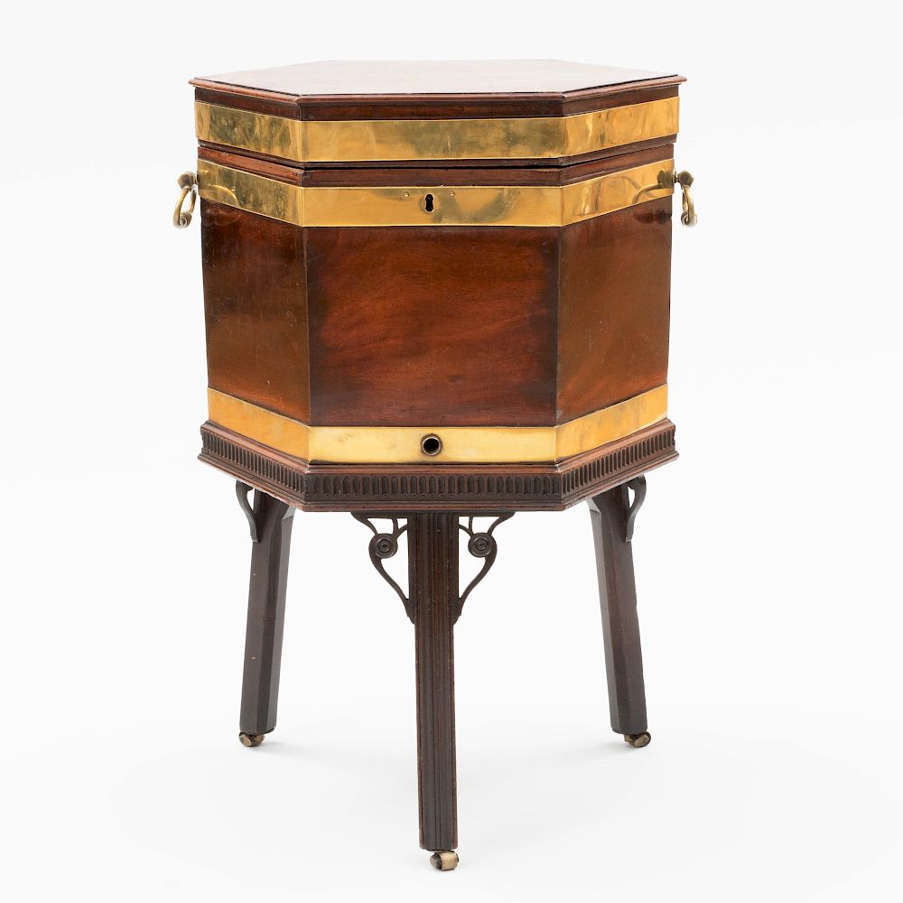 Appraisal: George III Brass-Mounted Mahogany Hexagonal Cellarette The hinged top opening