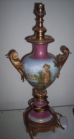 Appraisal: A French porcelain table lamp with gilt metal mounts cm