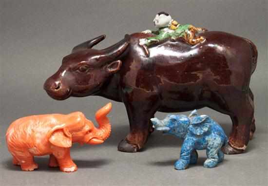 Appraisal: Chinese porcelain figural group Chinese carved lapis lazuli elephant figure