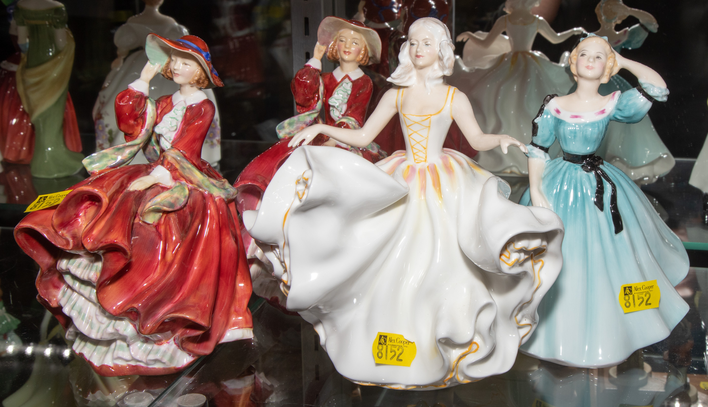 Appraisal: FOUR ROYAL DOULTON FIGURES Including Sweet Seventeen Tallest in H