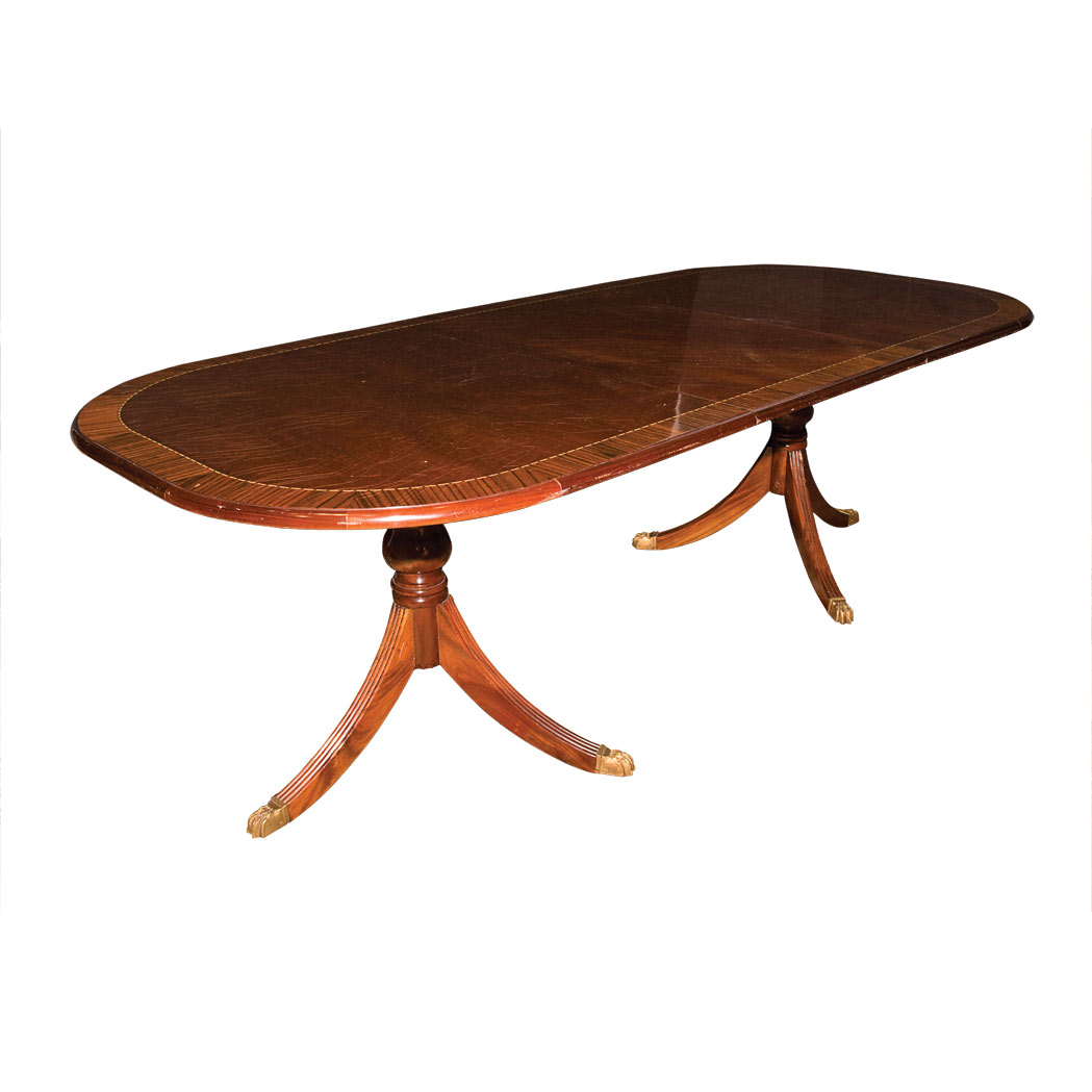 Appraisal: Regency Style Banded Mahogany Double-Pedestal Dining Table Including two leaves