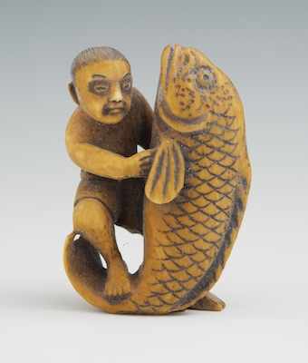 Appraisal: Carved Ivory Netsuke of a Man with Fish Man standing