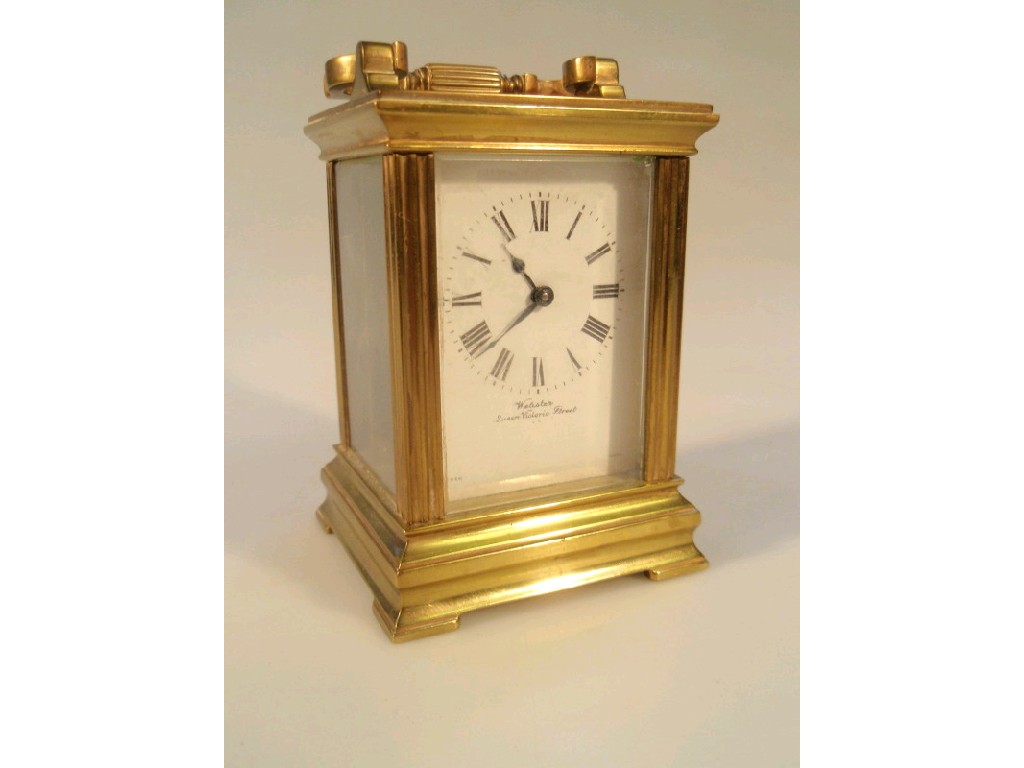 Appraisal: A small French brass carriage clock with white enamel dial