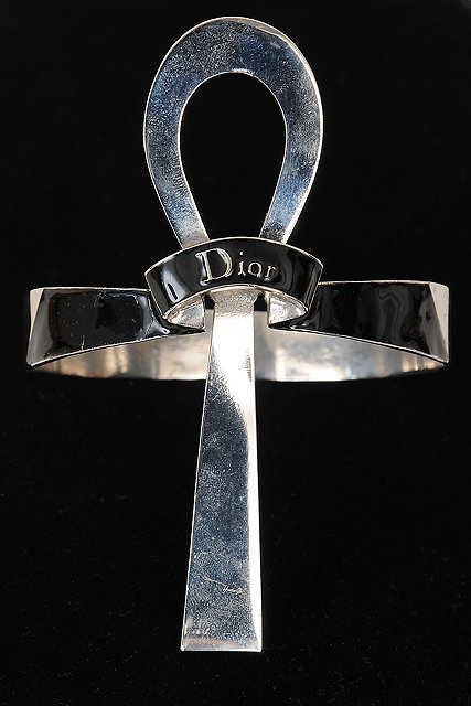 Appraisal: A Christian Dior arm bangle black enamel band with silvered