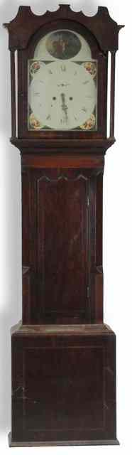 Appraisal: A mahogany cased eight-day longcase clock fitted a painted arch