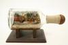 Appraisal: SHIP IN A BOTTLE - Folk art cargo ship with